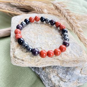 Bracelet Chakra Racine – Pierres Naturelles pour Ancrage et Bien-Être”.