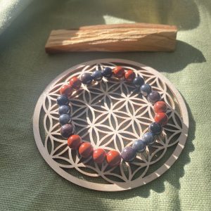 Bracelet Chakra Racine – Pierres Naturelles pour Ancrage et Bien-Être”.